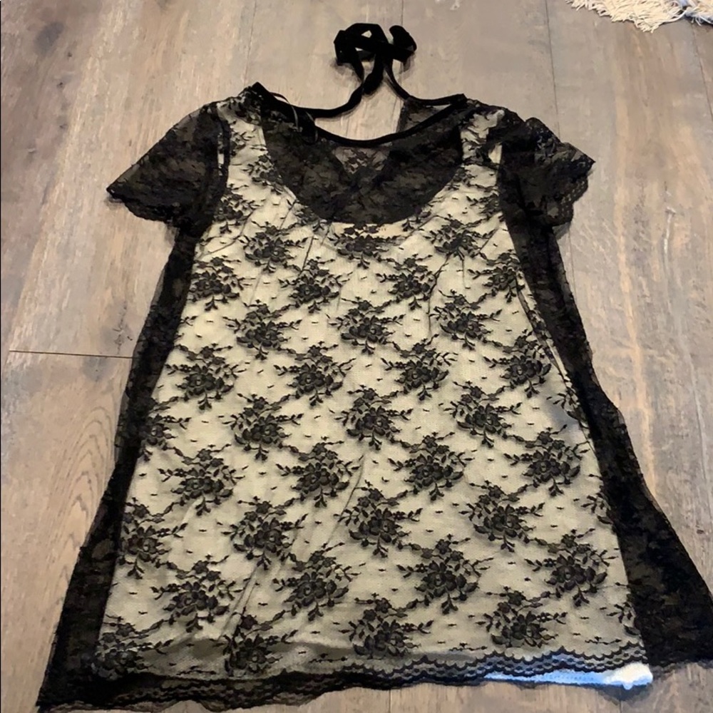 Black lace dress with white knitted dress under